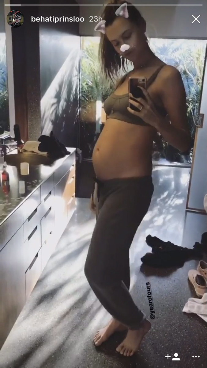 Behati Prinsloo showed off her growing baby bump in a video she shared to Instagram. The 28-year-old model wore a gray sweatpants and a sports bra for the selfie she posted on Oct. 21, 2017. Prinsloo and her husband Adam Levine are expecting their second child together sometime next year.