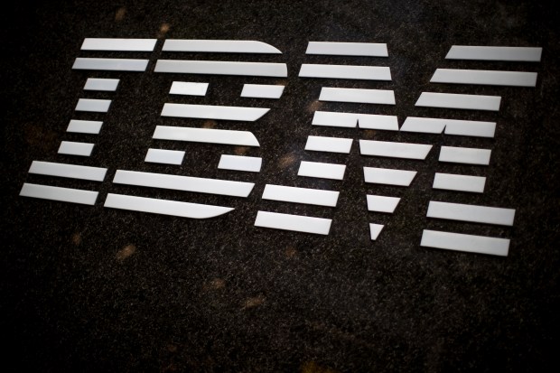 FILE - The IBM logo is displayed on the IBM building in Midtown Manhattan, April 26, 2017, in New York. IBM has agreed to sell assets of The Weather Company to private equity firm Francisco Partners for an undisclosed amount, the two companies announced Tuesday, Aug. 22, 2023. The acquisition will include Weather Channel mobile and the Weather.com among other digital properties and enterprise offerings across industries and mediums, as well as The Weather Company's forecasting science and technology platform. (AP Photo/Mary Altaffer, File)