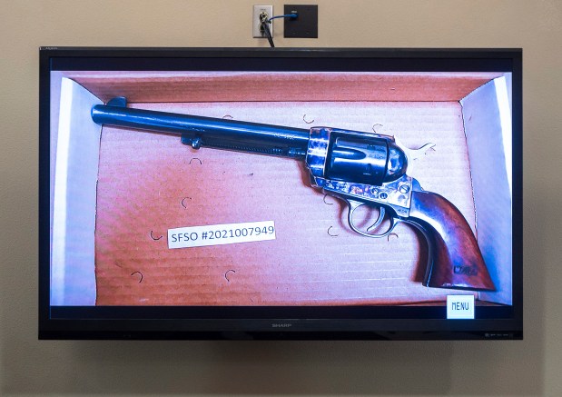The revolver that actor Alec Baldwin was holding and fired, killing cinematographer Halyna Hutchins and wounding the film's director, Joel Souza, is displayed during the trial against Hannah Gutierrez-Reed, in Santa Fe, N.M., Thursday, Feb. 22, 2024. (Eddie Moore/The Albuquerque Journal via AP, Pool)
