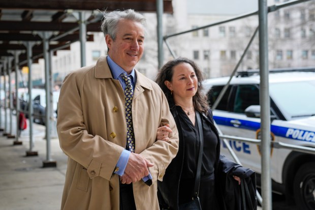 Former Rock & Roll Hall of Fame curator Craig Inciardi, left, leaves court, Wednesday, March 6, 2024, in New York. New York prosecutors abruptly dropped their criminal case midtrial Wednesday against three men who had been accused of conspiring to possess a cache of hand-drafted lyrics to "Hotel California" and other Eagles hits. (AP Photo/Mary Altaffer)
