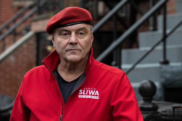 Curtis Sliwa with cats outside of Mayor Eric Adams' rat-infested apartment building at 936 Lafayette Ave in Brooklyn, New York, Wednesday, January 4, 2023. (Shawn Inglima for New York Daily News)