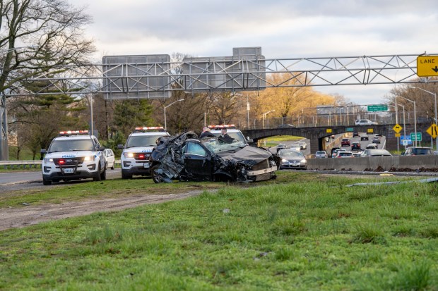 A 24yr old woman riding as a passenger inside a 2017 Mercedes Benz was pronounced dead at Long Island Jewish Hospital after the 26yr old female driver of the car lost control and struck a guardrail while southbound on the Cross Island Parkway near the Belt Parkway in Queens on Friday April 8, 2022. 0708. The 26yr old driver and another 32yr old woman, who was also a passenger inside the car, were taken to North Shore University Hospital Long Island. (Theodore Parisienne)