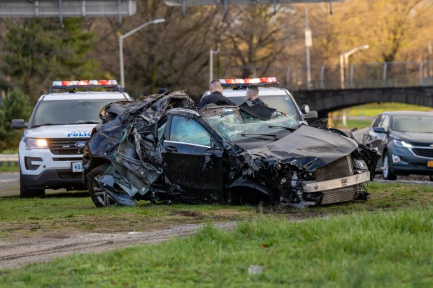 The speeding Mercedes-Benz slammed into a guardrail on the Cross Island Expressway near the Linden Blvd. exit in Cambria Heights about 3:20 a.m. April 8, 2022. (Theodore Parisienne for New York Daily News)