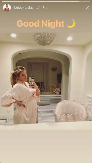 As her sisters Kim, Kourtney, and Kendall hit the slopes in Utah, pregnant Khloe Kardashian stayed at home in Los Angeles and wished her fans goodnight. The mother-to-be wore a silk robe that hugged her baby bump before bed on Feb. 18, 2018.
