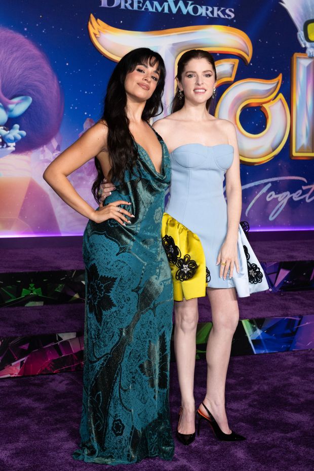 US-Cuban singer-songwriter Camila Cabello (L) and US actress Anna Kendrick arrive for the premiere of "Trolls: Band Together" at the TCL Chinese Theater in Hollywood, California, on November 15, 2023. (Photo by VALERIE MACON / AFP) (Photo by VALERIE MACON/AFP via Getty Images)