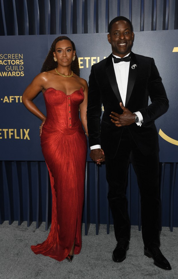 US actor Sterling K. Brown and his wife actress Ryan Michelle Bathe arrive for the 30th Annual Screen Actors Guild awards at the Shrine Auditorium in Los Angeles, February 24, 2024. (Photo by VALERIE MACON / AFP) (Photo by VALERIE MACON/AFP via Getty Images)