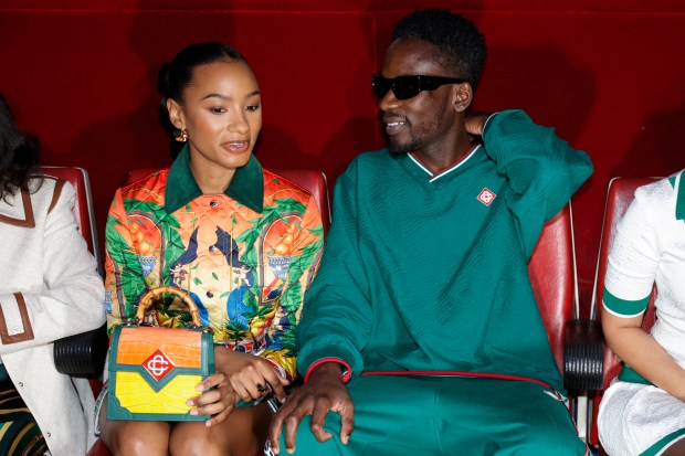 Nigerian actress and fashion blogger Temi Otedola and her husband Nigerian singer and songwriter Mr Eazi (R) pose ahead of the presentation of creations by Casablanca for the Women Ready-to-wear Fall-Winter 2024/2025 collection as part of the Paris Fashion Week, in Paris on February 28, 2024. (Photo by Geoffroy VAN DER HASSELT / AFP) (Photo by GEOFFROY VAN DER HASSELT/AFP via Getty Images)