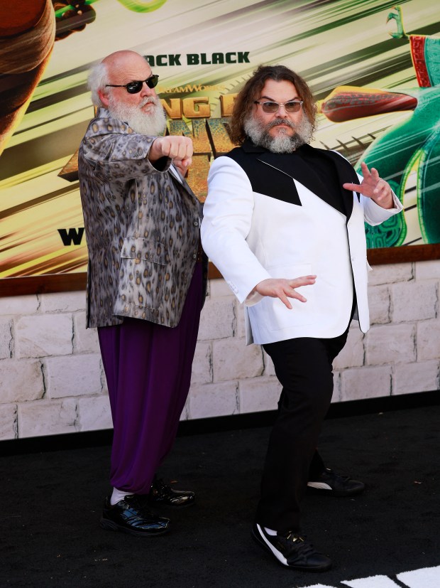 US musician Kyle Gass (L) and US actor Jack Black attend the premiere of Universal Pictures' "Kung Fu Panda 4" at the AMC The Grove theatre in Los Angeles, California, March 3, 2024. (Photo by Michael Tran / AFP) (Photo by MICHAEL TRAN/AFP via Getty Images)