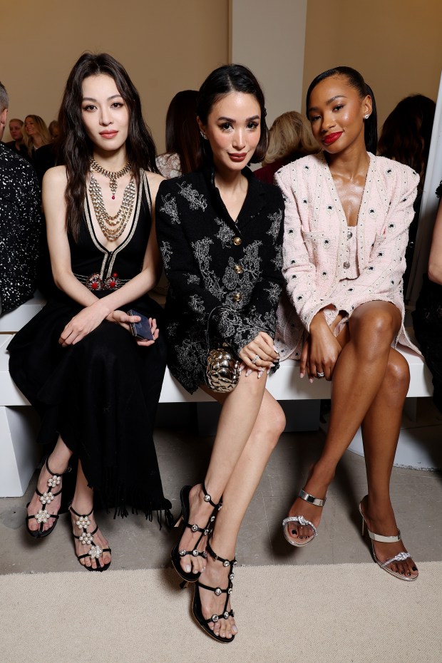 PARIS, FRANCE - MARCH 01: (EDITORIAL USE ONLY - For Non-Editorial use please seek approval from Fashion House) (L-R) Elaine Zhong, Heart Evangelista and Temiloluwa Otedola attend the Giambattista Valli Womenswear Fall/Winter 2024-2025 show as part of Paris Fashion Week on March 01, 2024 in Paris, France. (Photo by Pascal Le Segretain/Getty Images)