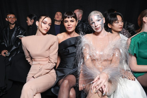 PARIS, FRANCE - MARCH 03: (EDITORIAL USE ONLY - For Non-Editorial use please seek approval from Fashion House) (L-R) Emma Chamberlain, Lisa Rinna and Jilia Fox attend the Mugler Womenswear Fall/Winter 2024-2025 show as part of Paris Fashion Week on March 03, 2024 in Paris, France. (Photo by Pascal Le Segretain/Getty Images)