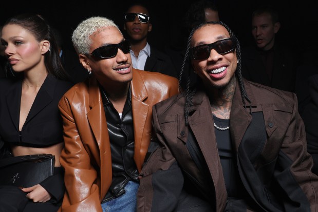 PARIS, FRANCE - MARCH 03: (EDITORIAL USE ONLY - For Non-Editorial use please seek approval from Fashion House) Alexander 'AE' Edwards and Tyga attend the Mugler Womenswear Fall/Winter 2024-2025 show as part of Paris Fashion Week on March 03, 2024 in Paris, France. (Photo by Pascal Le Segretain/Getty Images)