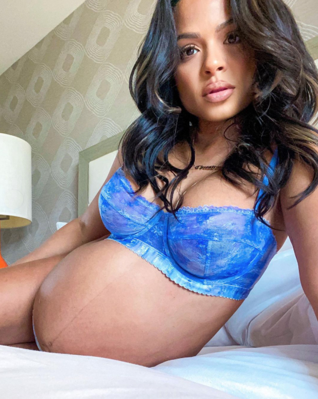 Christina Milian stuns in blue Savage X Fenty lingerie while showing off her growing baby bump on Wednesday, April 14, 2021. The 39-year-old actress is expecting her third child, second with husband Matt Pokora.