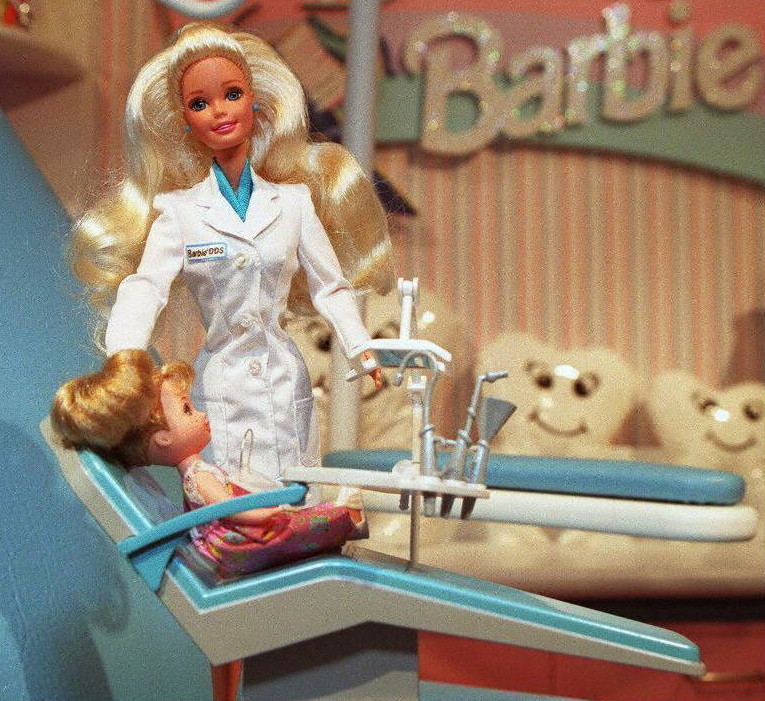 Seen in one of her many professions, a dentist Barbie doll is displayed Feb. 10, 1997, in New York during the first day of the International Toy Center annual fair.