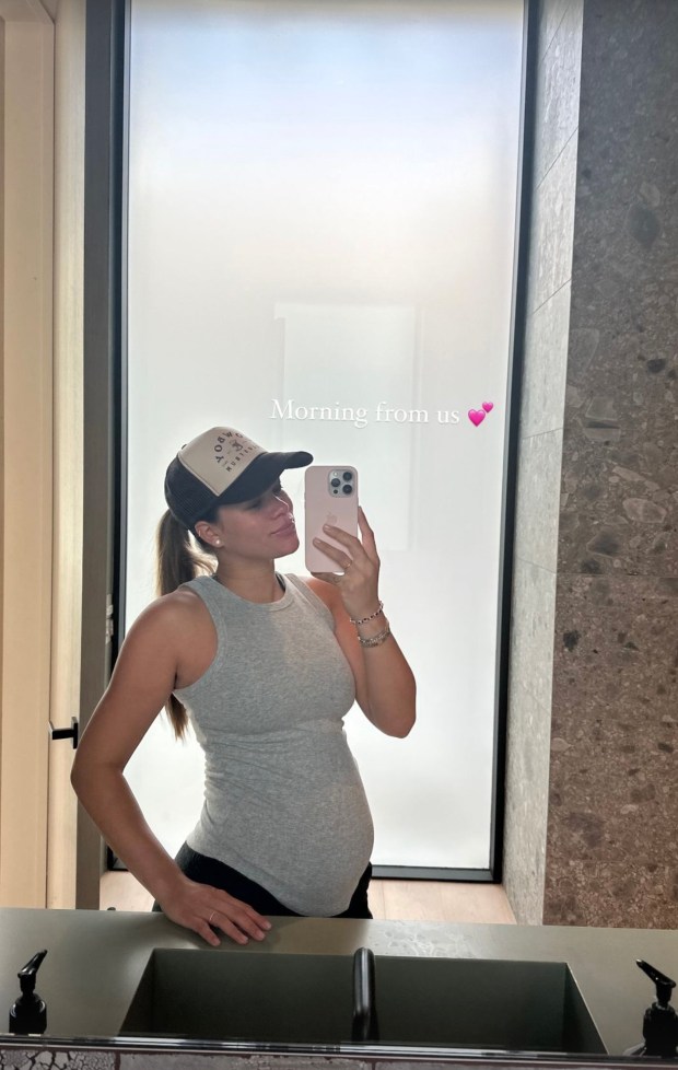 Sofia Richie Griange shows off her growing baby bump with a mirror selfie on Monday, March 4, 2024. "Morning from us." Grainge is expecting her first child with husband Elliot.