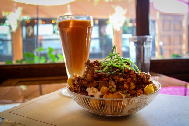 Thai disco fries and iced tea at Thai Diner. (Kaitlyn Rosati for New York Daily News)