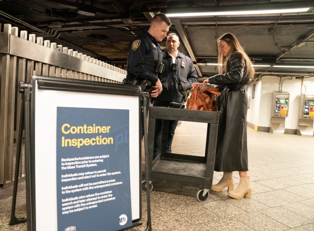 MTA Police conduct bag checks at Grand Central Station Wednesday, March 6, 2024 in Manhattan, New York. In addition, National Guard and New York State Police provide security nearby. (Barry Williams for New York Daily News)
