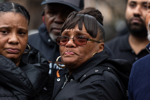 Danette Hollie, center, mother of Nazim Berry, overcome with emotion during a press before the United Bodegas of America and Pro-Health donate $8,000 to the family of Nazim Berry, a bodega clerk who was murdered over a cigarette, to help cover funeral expenses, at Shorey Grocery Corporation, 801 Franklin Ave, Brooklyn, New York on Wednesday, Feb. 28, 2024. (Shawn Inglima for New York Daily News)