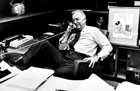 Walter Cronkite left the air having spent nearly two decades crafting and influencing network news nightly. His style and approach to the news continue to inspire and shape the media today. Here, Cronkite speaks on the phone in his office on March 6, 1981, prior to his final newscast as CBS anchorman in New York, with a framed Mickey Mouse cartoon and his Emmy award behind him.