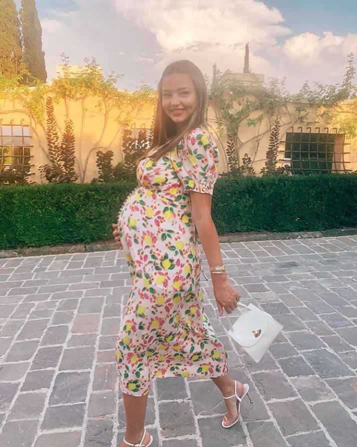 Miranda Kerr looked radiant with her baby bump during an out and about day on August 11, 2019. The soon-to-be mom of three, donning a summer dress covered in lemons, was glowing in her late afternoon sunset photo on Sunday. Kerr will soon be expecting her third child, her second with husband Evan Spiegel.